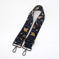 Detail of leopard print wide strap with navy blue and gold fabric and matte black hooks - Dark Blue With Gunmetal Buckle