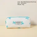 Trousse matelassée en coton blanc avec nœuds bleus, taille 20x6x8cm et finition souple - Trousse à Nœud Bleu et Blanc