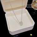 Silver titanium necklace with pearl ball pendant displayed in a white jewelry box - X601 Silver Pearl Circle