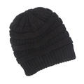 Close-up of black knitted beanie showing coarse knit texture and ribbed edge detail - Black