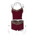 Detail of burgundy crop top and shorts set featuring leopard faux fur trim details - S / Burgundy