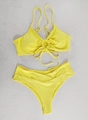 Detail of yellow halter bikini top with ruched center and V-cut high waist bottoms - Yellow