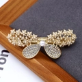 Elegant gold alloy spring hair clip with white pearls and sparkling bow rhinestones - Pearl Butterfly
