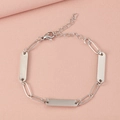 Detail of silver stainless steel paperclip chain bracelet with engravable blank plates - 3 Bars / Steel