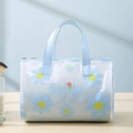 Light blue transparent PVC daisy toiletry bag with zipper and handle for travel - Blue Daisy (Cylindrical Large)