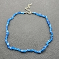 Irregular blue cat eye stone chip necklace with silver lobster clasp on grey background - Bracelet / Dark Blue Cat Eye