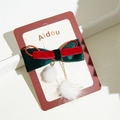 Christmas bow hair clip with red and green velvet ribbons and white fur pom-poms - Fur Ball Pendant Style