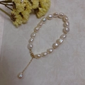 Macro shot of Baroque pearls with rainbow luster and 14K gold-filled lobster clasp - Baroque Irregular Pearl Style (SL7-1)