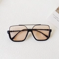 Lunettes de soleil carrées rétro avec verres ambrés et monture noire à double pont chic - Monture Noire Champagne