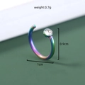 Macro shot of rainbow stainless steel piercing jewelry with clear zircon and dimensions - Colorful