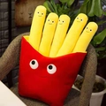 Creative plush French fries pillow with smiling faces in a red box on a chair - 30 cm / French Fries