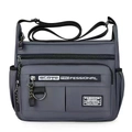 Dark gray waterproof nylon crossbody bag with multi-pocket design and adjustable strap - Gray
