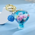 Blue hot air balloon liquid keychain with macaron beads and bell on a gold clasp - Gradient Rope + Colorful Bead Milk Tea Cup / Hot Air Balloon [Blue]