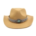 Close-up of camel western cowboy hat featuring ethnic braided band and turquoise stone - Camel