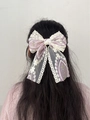 Elegant lavender floral lace bow hair clip for women with a large mesh design - Medium - Purple Oval