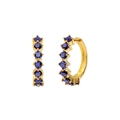 Detail of gold huggie hoop earrings featuring six inlaid round dark blue cubic zirconia - Gold / Dark Blue Zirconia