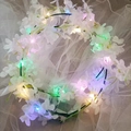 Luminous Hawaii floral headband with white flowers and colorful LED lights on white mesh - White