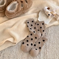 Beige mid-calf wool socks with black polka dots in a cozy winter style layout - One Size / Khaki
