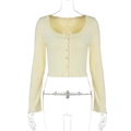 Detail of light yellow knit cardigan featuring fine rib texture and small buttons - S / Yellow
