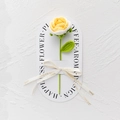 Close-up of handmade crochet rose bouquet with yellow flowers and Love Is Eternal ribbon - Rose - Gradient Yellow