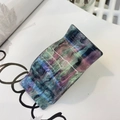 Macro detail of acrylic hair claw clip with purple and green marble texture finish - Starry Blue Green
