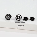 Detail view of black stainless steel @ stud earrings with 0.8cm diameter and size specs - 040 @ Symbol / Black
