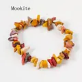 Handmade elastic bracelet featuring irregular natural egg yolk stone beads in yellow hues - Yellow Jasper