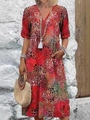 Floral print V-neck midi dress with short sleeves and abstract pattern on model - S / Bottoms / Watermelon red