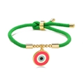 Adjustable green woven rope bracelet with gold metal and pink enamel evil eye charm - Green
