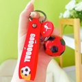 Creative red football keychain with goal wristlet and silhouette charm for backpacks - Red