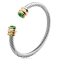 Silver twisted cable cuff bracelet with gold accents and green gemstones on white background - May (Green)
