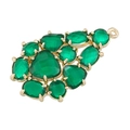 Close-up of a gold-plated copper pendant featuring emerald green glass leaf gems - Type K-Emerald Green