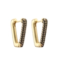 Macro detail of geometric V-shaped gold earrings with paved black zircon stones - Gold Black Zirconia