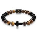 Detailed view of tiger eye beads bracelet with black cross and letter D charm - Letter D