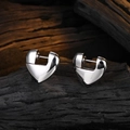 Polished silver heart earrings on dark textured wood base for a minimalist aesthetic - Copper / White Gold
