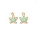 Detailed view of mint green enamel starfish alloy pendants with golden metal base - Green