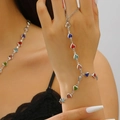 Close-up of colorful heart-shaped gemstone hand chain and necklace set for women - Silver Multicolor Heart Slave Bracelet (3655)