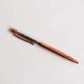 Close-up of rose gold crystal ballpoint pen with colorful gemstones in clear barrel - Mixed Tourmaline
