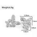 Pendientes de mariposa en acero plateado con dimensiones detalladas y peso del producto - Plata/Mariposa