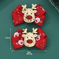 Detail view of handmade Christmas hair bow with reindeer sequin and size measurements - Christmas Reindeer Bow Hair Clip