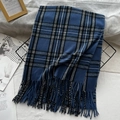 Blue plaid imitation cashmere scarf with tassels, soft winter shawl displayed on a rack - Haze Blue