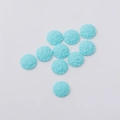 Detailed view of 12mm light blue round resin druzy stones with glittering texture - 12mm / Light Blue (25)