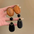 Close-up of geometric earrings featuring brown wood texture and black teardrop drops - 8# Silver Earring Post-Coffee-Black (Wood Geometric Mix)