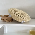 Straw hollow beret in beige with decorative cloth tags on a minimalist white shelf - 56-59cm / Beige