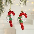 Red candy cane Christmas ornament with white glitter bow and green holly leaf detail - Candy Cane (Set of 2)