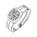 Macro shot of men's S925 silver ring with large round moissanite in a four-prong setting - Silver/Grooved Band/1 Carat/6.5mm
