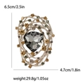 Vintage bird nest brooch in silver metal with dark grey faceted crystal and rhinestones - Gray
