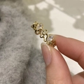Golden chain link ring with oval clear crystals and colorful enamel butterfly design - Oval Stone Row