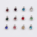 Disposition en matrice de 12 pendentifs ronds multicolores en acier inoxydable - Rouge de juillet (SR001) / Acier
