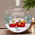 Acrylic Happy Camper Christmas ornament with retro red trailer and snowy pines hanging - Happy Camper Van 2023